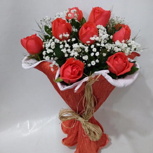 Buque com 12 rosas coral