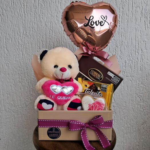 Cesta de chocolates com pelucia