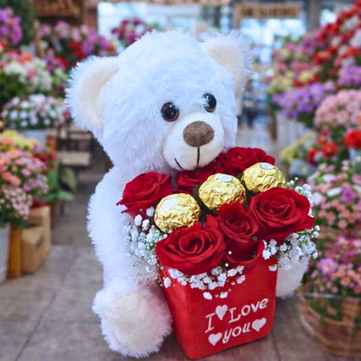 Urso de peluciaTuka Toy 20 cm com flores e chocolates